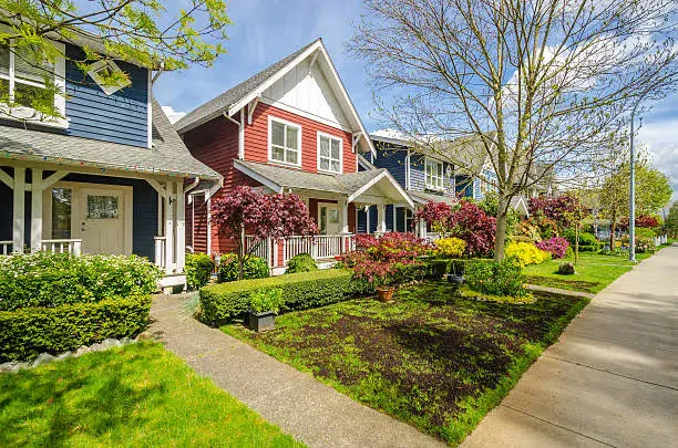 A row of houses in a nice neighborhood.